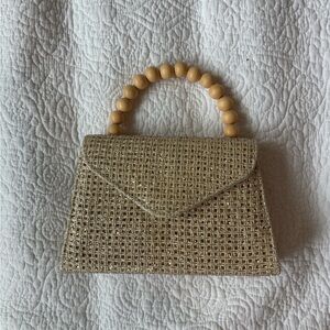 Elegant Gold Woven Handbag with Wooden Handle